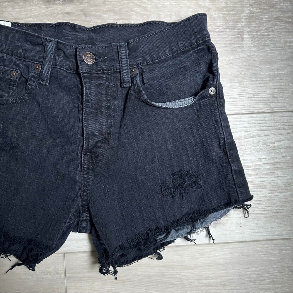 Levi’s cutoff jean shorts - black distressed - size 28